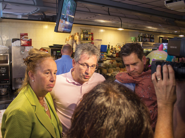 L to R: Manhattan Borough President Gale Brewer, Malibu Diner co-owner Alex Grimpas, NY State Senator Brad Hoylman (with daughter). Photo by Naeisha Rose.